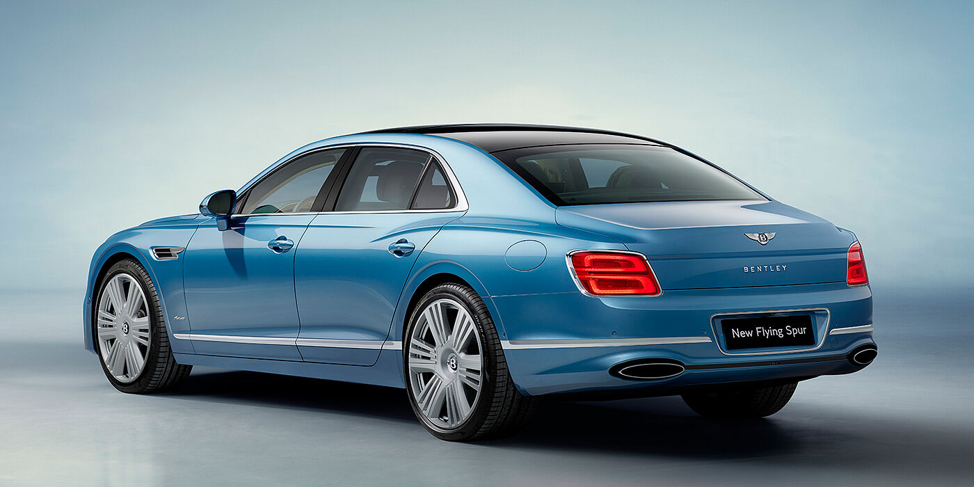 Bentley Monaco New Bentley Flying Spur Azure sedan rear view in Light windsor blue by Mulliner paint with 22 inch Azure wheels and chrome exterior details
