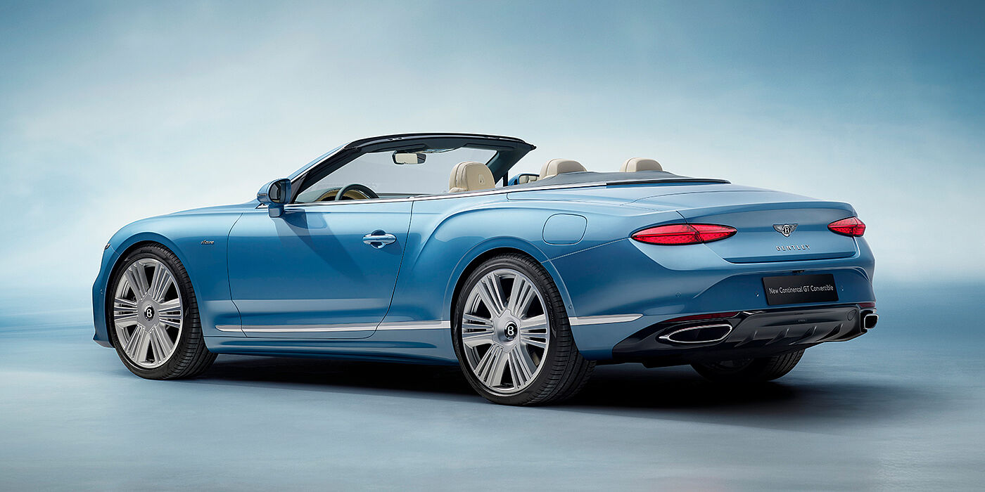 Bentley Monaco New Bentley Continental GTC Azure convertible rear view in Light Windsor blue paint with 22 inch ten spoke wheels and chrome exterior details