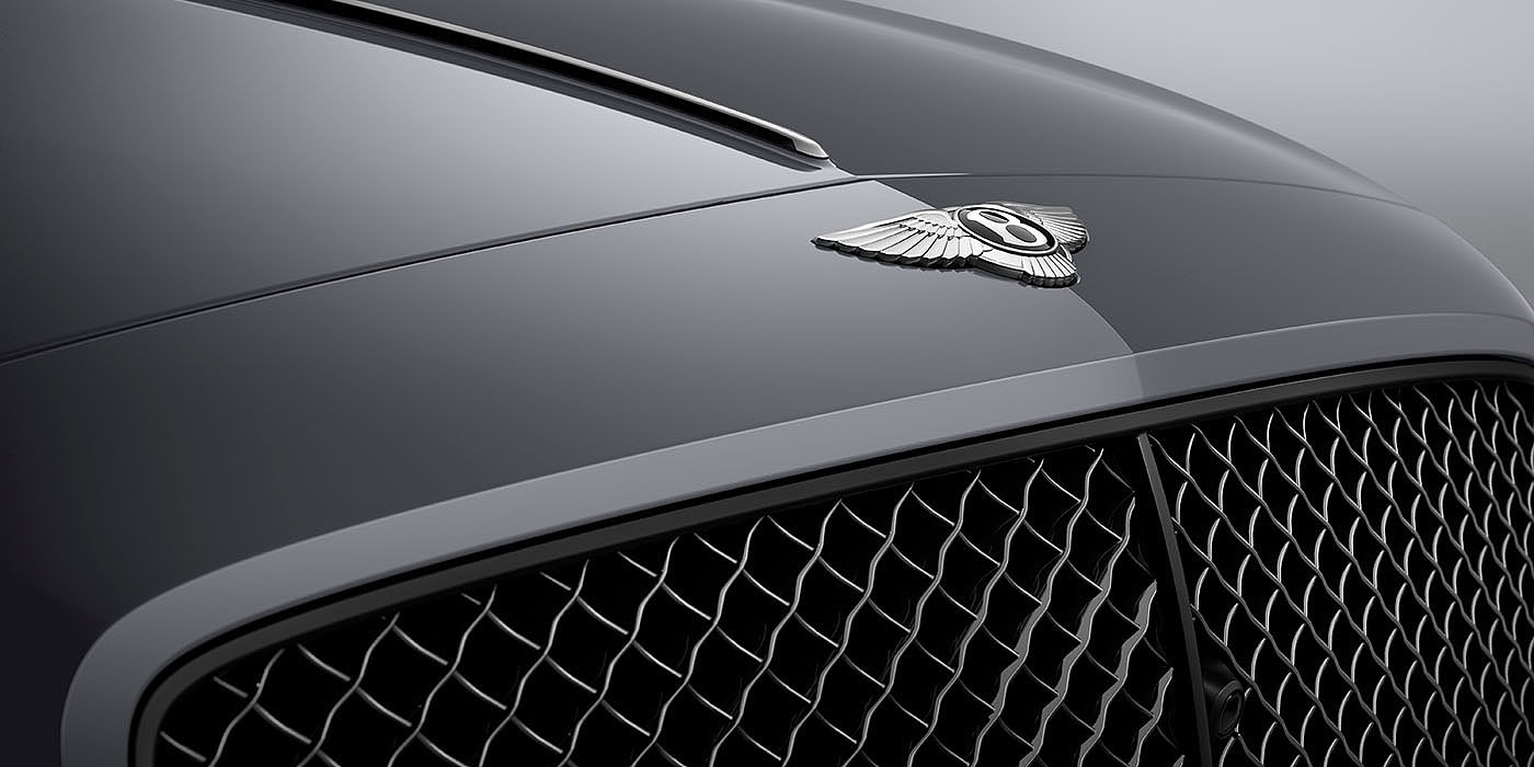 Bentley Monaco Bentley Flying Spur S Cambrian Grey colour, featuring Bentley insignia and assertive matrix front grillle