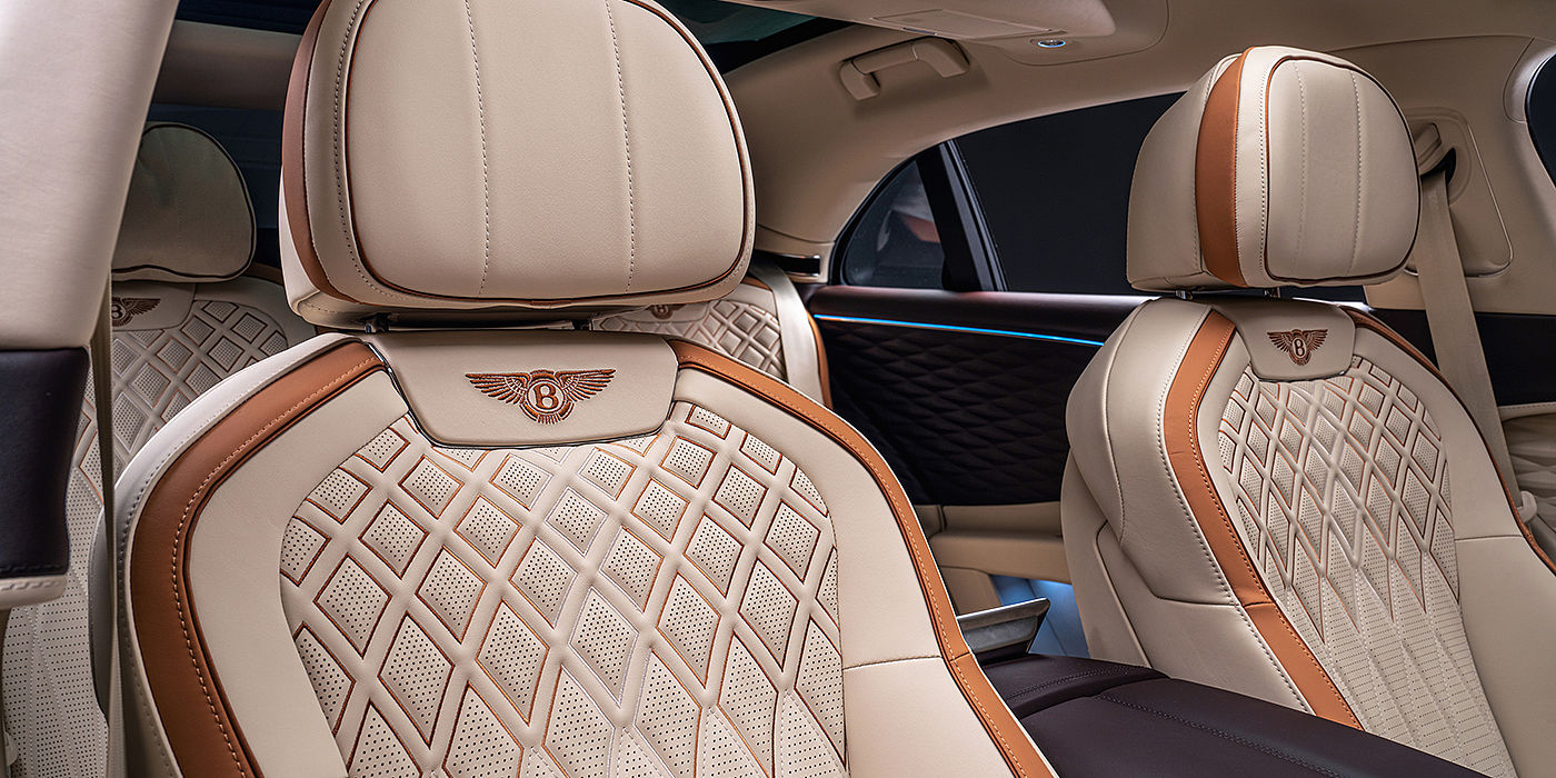 Bentley Monaco Bentley Flying Spur Odyssean sedan rear seat detail with Diamond quilting and Linen and Burnt Oak hides