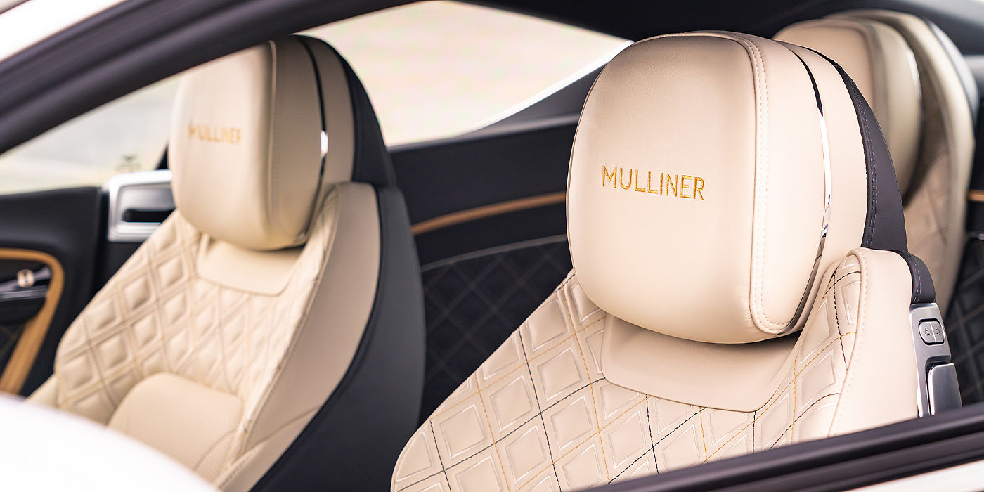 Bentley Monaco Bentley Continental GT Mulliner coupe seat detail in Beluga black and Linen hide
