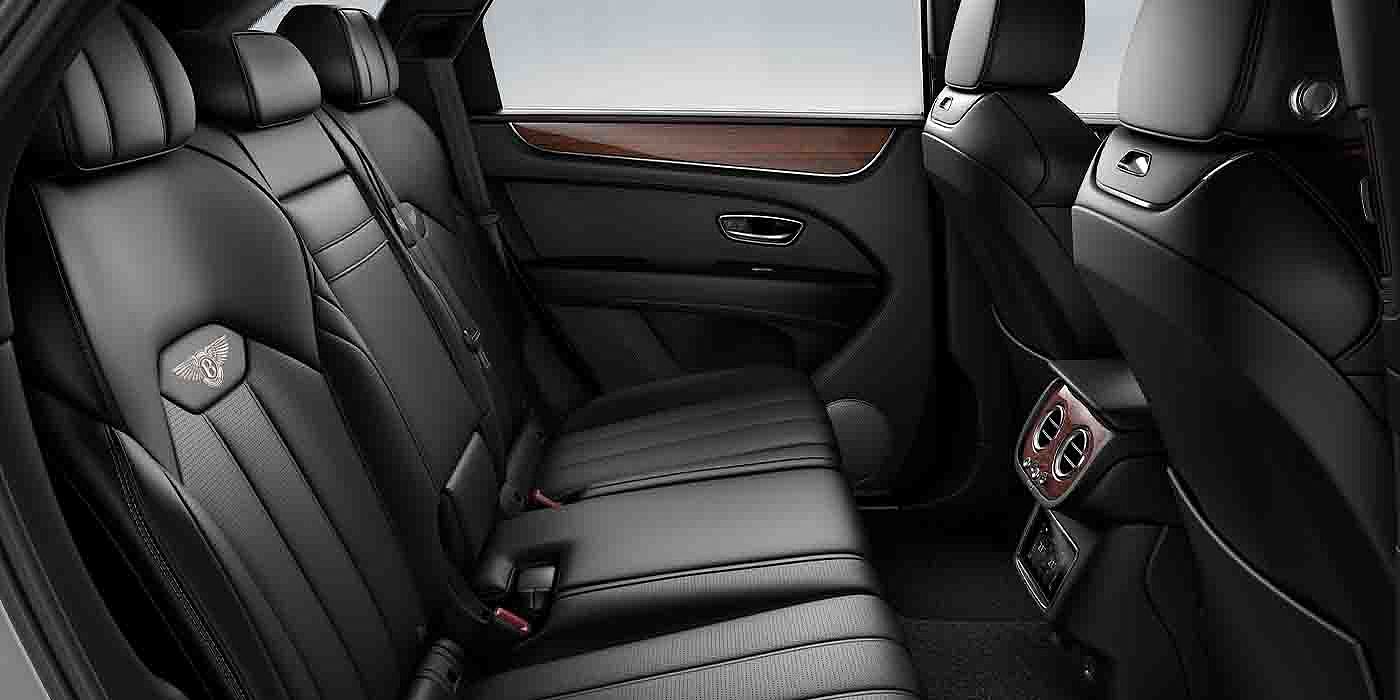 Bentley Monaco Bentley Bentayga EWB interior view for rear passengers with Beluga black hide.