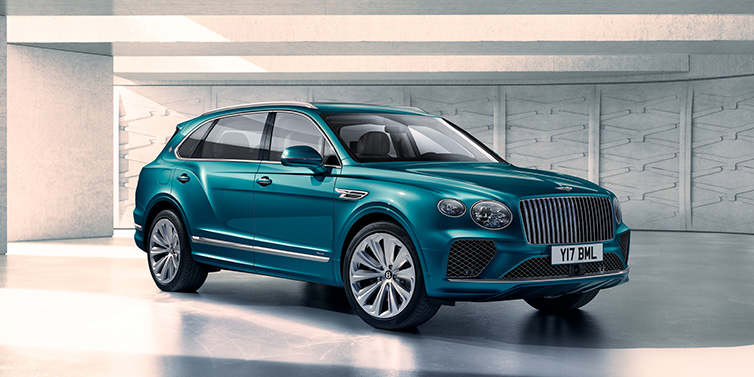 Bentley Monaco Bentley Bentayga Extended Wheelbase Azure SUV front three quarter in Topaz blue paint colour with a grey background