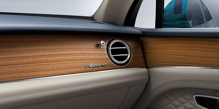 Bentley Monaco Bentley Bentayga Extended Wheelbase Azure front dash showing Open Pore Koa veneer surrounded by Portland and Imperial Blue hides