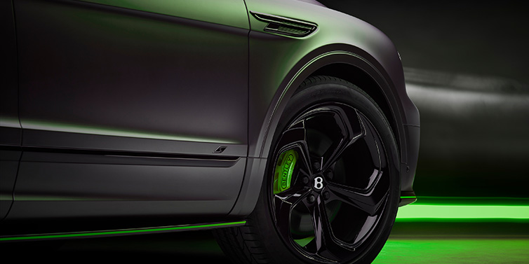 Bentley Monaco Bentley Bentayga S Black Edition SUV exterior wheel detail with Cyber Green brakes with Anthracite Satin paint