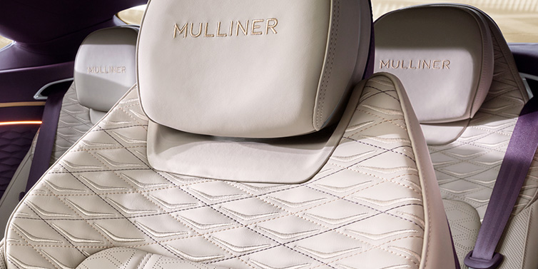 Bentley Monaco Bentley Continental GT Mulliner coupe seat detail in Linen leather with Mulliner Diamond in Diamond quilting and Mulliner embroidered seat emblem